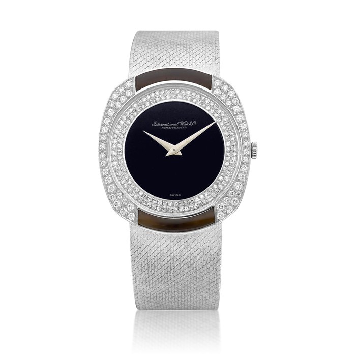 IWC A white gold, diamond and onyx-set bracelet watch with onyx dial, Circa 1980 | 萬國 | 白金鑲鑽石及瑪瑙鏈帶腕錶，備瑪瑙錶盤，約1980年製
