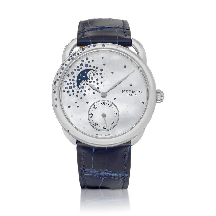 Hermès Arceau Petite Lune, Reference AR7.A30  | A stainless steel, diamond and sapphire-set wristwatch with date, moon phases and mother-of-pearl dial, Circa 2021  |  愛馬  | 仕 Arceau Petite Lune 型號AR7.A30 | 精鋼鑲鑽石及藍寶石腕錶，備日期、月相顯示及珠母貝錶盤，約2021年製 · AR7.A30