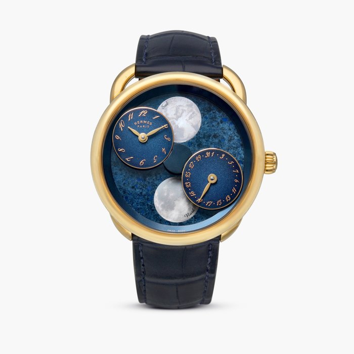 Hermès Arceau L' Heure de la Lune, Reference AR1.885A | A yellow gold wristwatch with date, moon phases and mother-of-pearl dial, Circa 2025 · AR1.885A