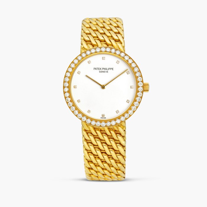 Patek Philippe Calatrava, Reference 5006/17 | A yellow gold and diamond-set bracelet watch, Circa 1994 · 5006/17