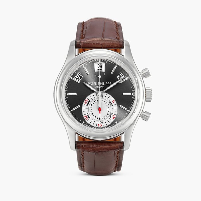 Patek Philippe Reference 5960 | A platinum annual calendar flyback chronograph wristwatch with power reserve and day and night indication, Circa 2007