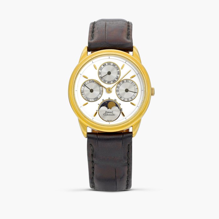 Piaget Gourverneur, Reference 15958 | A yellow gold triple calendar wristwatch with moon phases, Circa 1990 · 15958