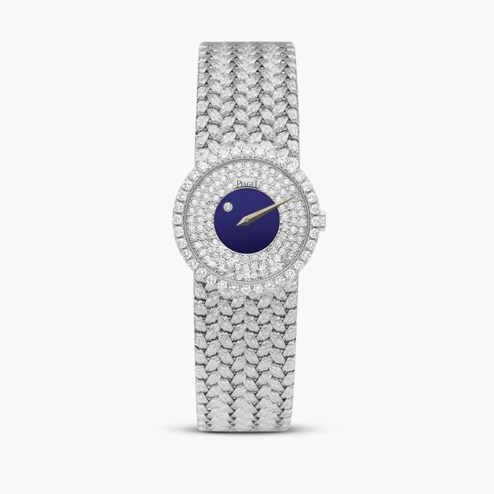Piaget Reference 9706 D 2 | A white gold and diamond-set bracelet watch with lapis lazuli dial, Circa 1970