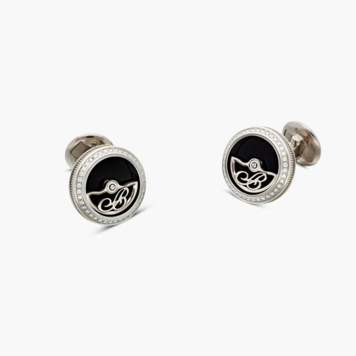Breguet A pair of white gold and diamond-set cufflinks with oscillating weight, Circa 2015