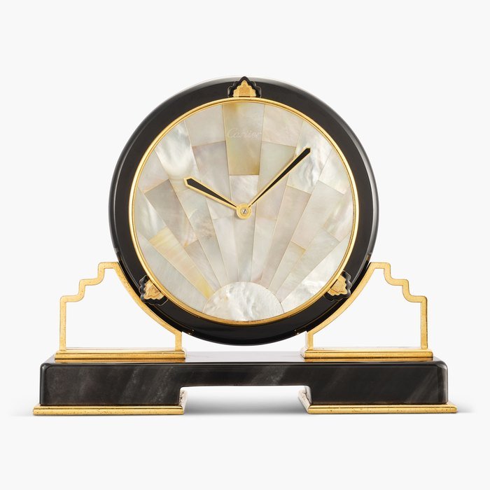 Cartier An obsidian and gilt brass desk clock with mother-of-pearl dial, Circa 1980