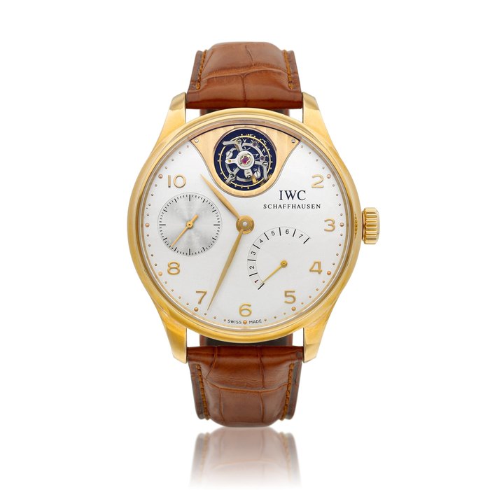 IWC Portuguese Tourbillon Mystère, Reference IW5042-02 | A limited edition pink gold tourbillon wristwatch with 7 days power reserve indication, Circa 2011 | 萬國 | 葡萄牙系列 | Tourbillon Mystère 型號IW5042-02 限量版粉紅金陀飛輪腕錶，備7天動力儲備顯示，約2011年製 · IW5042-02