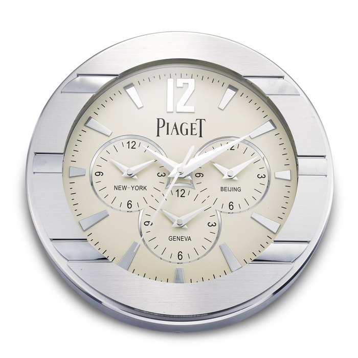Piaget A metal work quadruple time zone wall clock, Circa 2010 | 伯爵 | 金屬四地時間掛牆鐘，約2010年製