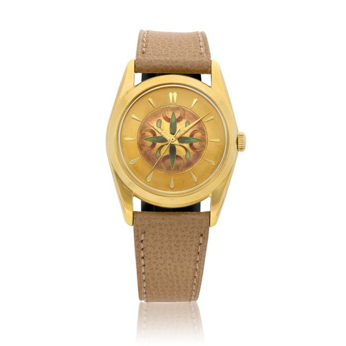 IWC Reference 580 | A yellow gold wristwatch with cloisonné enamel dial, Made in 1953 | 萬國 | 型號580 | 黃金腕錶，備掐絲琺瑯錶盤，1953年製 · 580