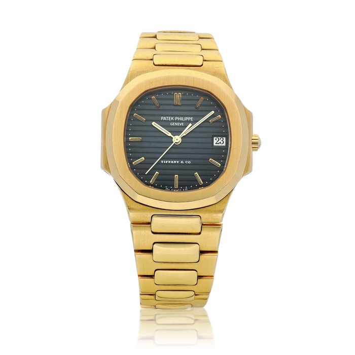 Patek Philippe Nautilus, Reference 3900 | A yellow gold bracelet watch with date, Retailed by Tiffany & Co., Made in 1991 | 百達翡麗  | Nautilus 型號3900 |  黃金鏈帶腕錶，備日期顯示，由 Tiffany & Co 發行，1991年製 · 3900