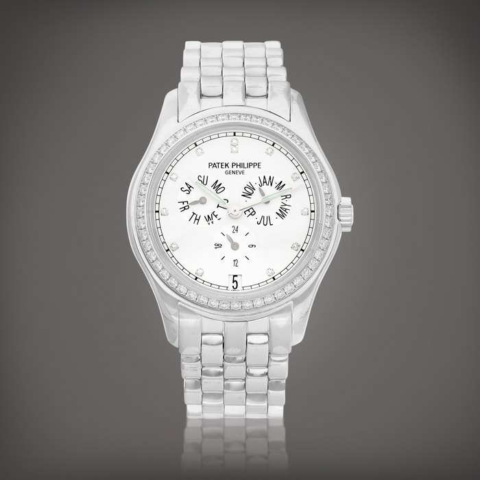 Patek Philippe Reference 5037 | A white gold and diamond-set annual calendar wristwatch with 24 hours indication and bracelet, Made in 2002 | 百達翡麗 | 型號5037 | 白金鑲鑽石年曆鏈帶腕錶，備24小時顯示，2002年製 · 5037