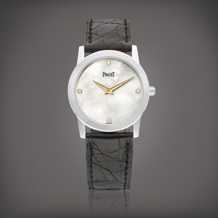 Piaget Reference 5894 | A white gold and diamond-set wristwatch with mother-of-pearl dial, Circa 1990 | 伯爵 | 型號5894 | 白金鑲鑽石腕錶，備珠母貝錶盤，約1990年製 · 5894
