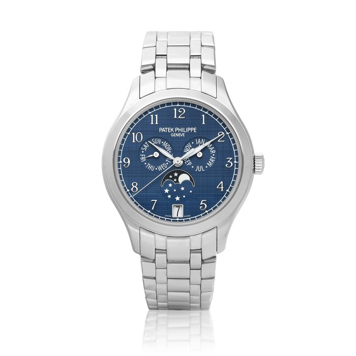Patek Philippe Reference 4947 | A stainless steel annual calendar wristwatch with date, moon phases and bracelet, Circa 2021 | 百達翡麗 | 型號4947 | 精鋼年曆鏈帶腕錶，備日期及月相顯示，約2021年製 · 4947