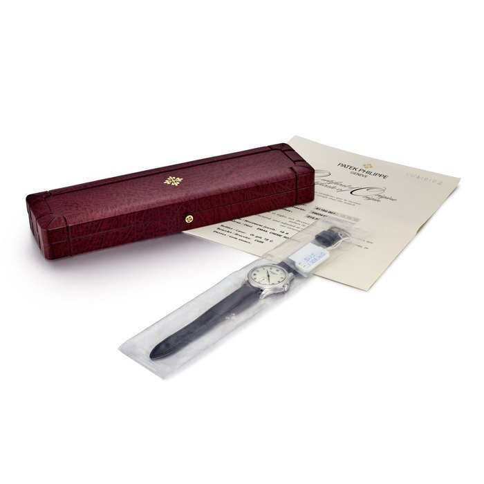 Patek Philippe Calatrava, Reference 5115 | A white gold wristwatch with enamel dial in single factory seal, Circa 2001 |  百達翡麗 |  Calatrava 型號5115 |  白金腕錶，備琺瑯錶盤，原廠未開封，約2001年製 · 5115