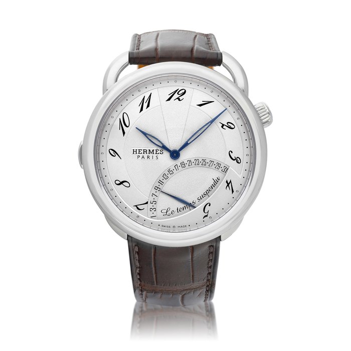 Hermès Arceau Le Temps Suspendu, Reference AR8.910 | A stainless steel wristwatch with retrograde date and time suspension, Circa 2012 | 愛馬仕 Arceau Le Temps Suspendu 型號AR8.910 | 精鋼腕錶，備逆跳日期及時間暫停裝置，約2012年製 · AR8.910