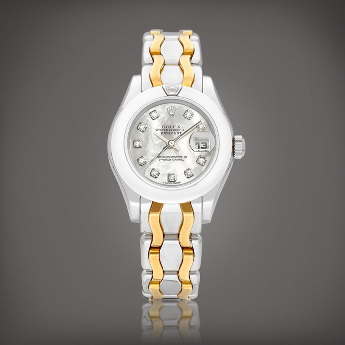 Rolex DateJust Pearlmaster, Reference 69329 | A two colour gold and diamond-set wristwatch with date, mother-of-pearl dial and bracelet, Circa 1995 | 勞力士 | DateJust Pearlmaster 型號69329 | 雙色金鑲鑽石鏈帶腕錶，備日期顯示及珠母貝錶盤，約1995年製 · 69329