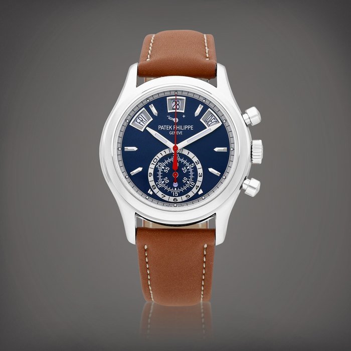 Patek Philippe Reference 5960 | A white gold annual calendar flyback chronograph wristwatch with power reserve indicator and day and night indication, Circa 2018 | 百達翡麗 | 型號5960 | 白金年曆飛返計時腕錶，備動力儲備及晝夜顯示，約2018年製 · 5960
