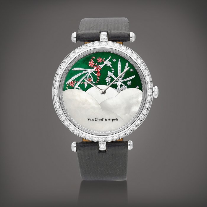 Van Cleef & Arpels Poetic Complications | A white gold and diamond-set wristwatch with date, month, enamel and mother-of-pearl dial, Circa 2010 | 梵克雅寶 | Poetic Complications | 白金鑲鑽石腕錶，備日期、月份顯示、琺瑯及珠母貝錶盤，約2010年製