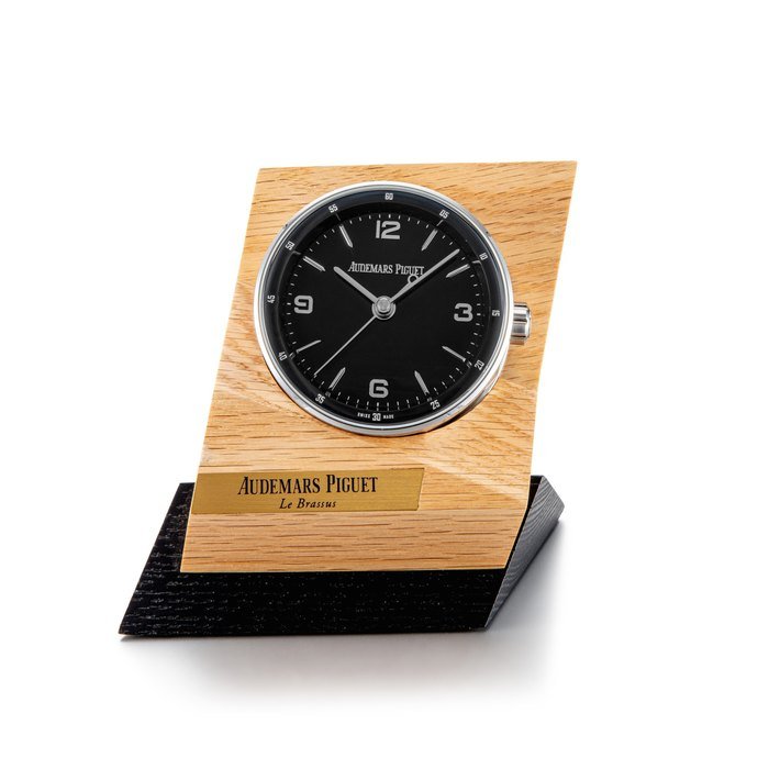 Audemars Piguet Code 11.59 | A stainless steel alarm desk clock with wooden stand, Circa 2019 | 愛彼 | Code 11.59 | 精鋼鬧鐘，備木製展示座，約2019年製
