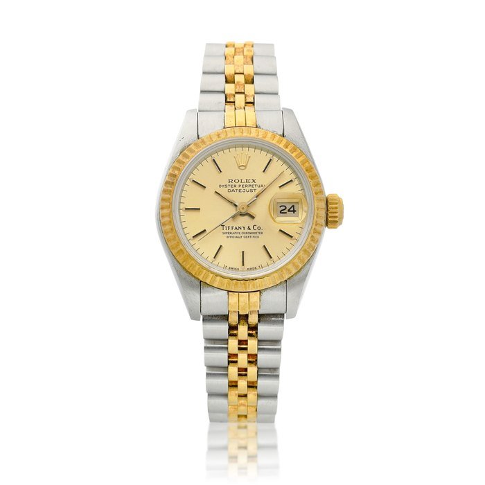 Rolex DateJust, Reference 69173, A yellow gold and stainless steel wristwatch with date and bracelet, Retailed by Tiffany & Co., Circa 1988 | 勞力士 DateJust 型號69173 黃金及精鋼鏈帶腕錶，備日期顯示，由 Tiffany & Co. 發行，約1988年製 · 69173