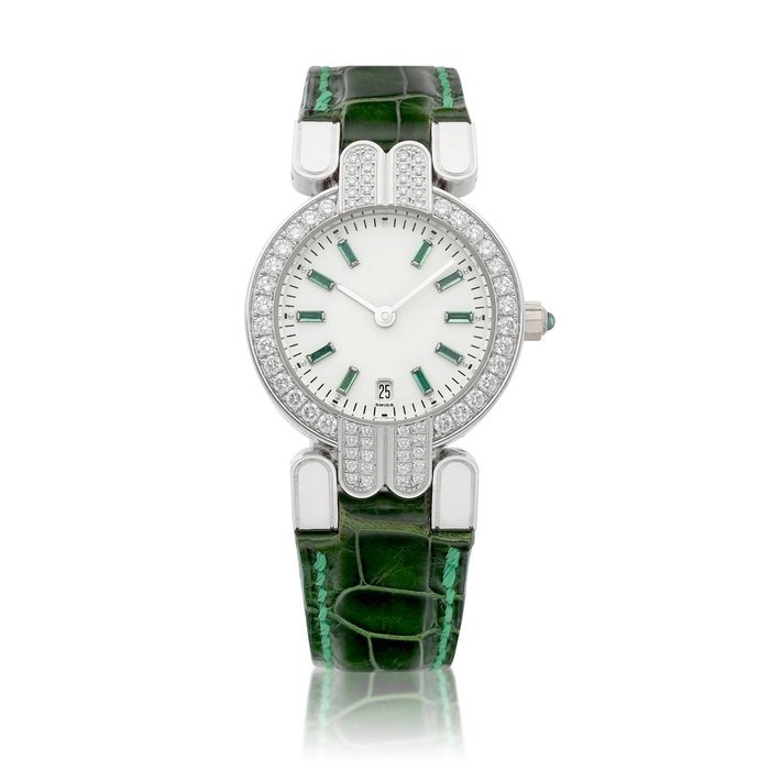 Harry Winston A white gold emerald and diamond-set wristwatch with date, Circa 1990 | 海瑞温斯頓 白金鑲綠寶石及鑽石腕錶，備日期顯示，約1990年製