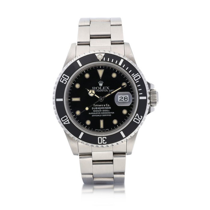 Rolex Rolex | Submariner, Reference 168000, A stainless steel wristwatch with date and bracelet, Retailed by Tiffany & Co., Circa 1988 | 勞力士 | Submariner 型號168000   精鋼鏈帶腕錶，備日期顯示，由Tiffany & Co.發行，約1988年製 · 168000