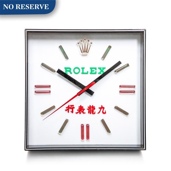Rolex Rolex | An acrylic light box wall clock, Circa 1970 | 勞力士 | 壓克力掛牆鐘，約1970年製