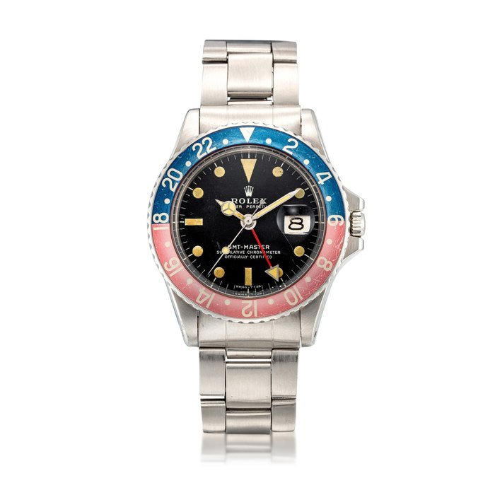 Rolex Rolex | GMT-Master, Reference 1675, A stainless steel dual time zone wristwatch with date and bracelet, Circa 1974 | 勞力士 | GMT-Master 型號1675   精鋼兩地時間鏈帶腕錶，備日期顯示，約1974年製 · 1675