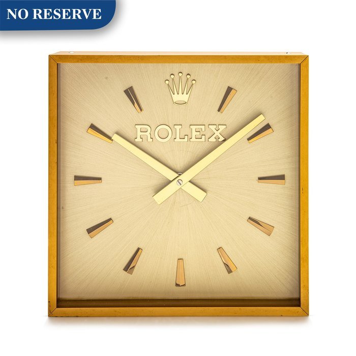 Rolex Rolex | A gilt brass wall clock, Circa 1980 | 勞力士 | 鍍金銅製掛牆鐘，約1980年製