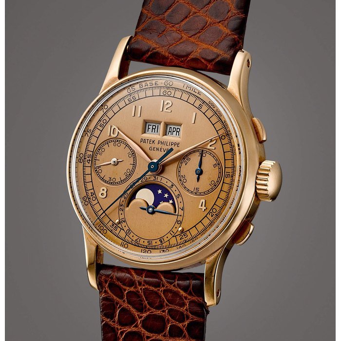 Patek Philippe Reference 1518 | A pink gold perpetual calendar chronograph wristwatch with moon phases and pink dial, Made in 1948 | 百達翡麗 | 型號1518 | 粉紅金萬年曆計時腕錶，備月相顯示及粉紅色錶盤，1948年製 · 1518