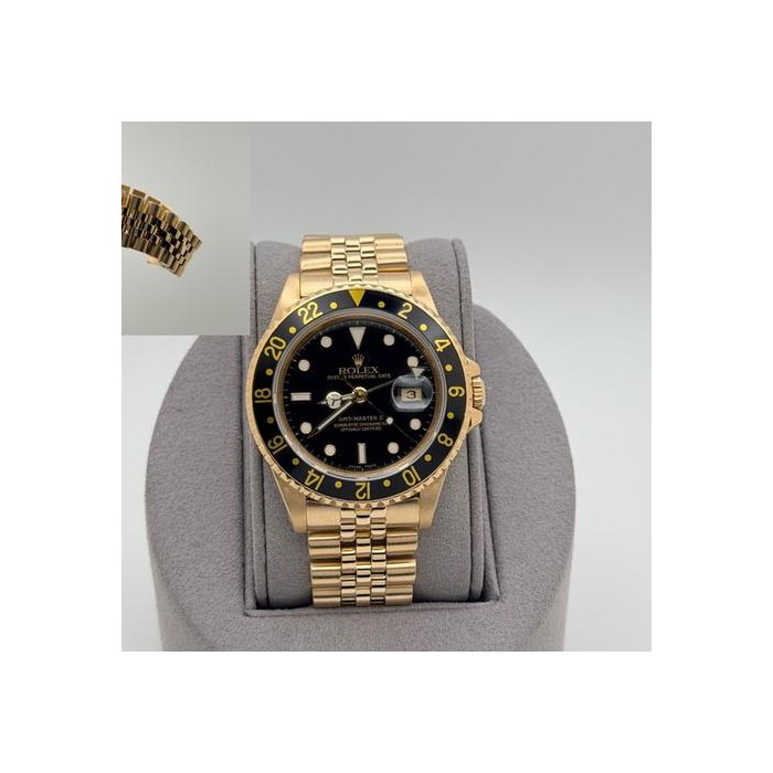 Rolex GMT-Master II16718 40mm Black Dial 18k Yellow Gold Jubilee