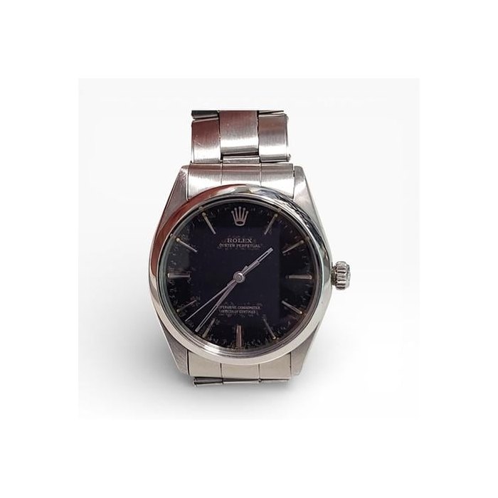 Rolex Oyster PerpetualVintage Rolex Oyster Perpetual 34 mm Black Gilt Dial Steel Watch 1002 Circa 1966 Gilt Dial Vintage