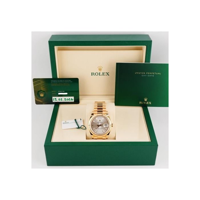 Rolex Rolex Day-Date228238 Day-Date 40mm 18K Yellow Gold Silver Index Dial Box and Papers 2026, Price & Market Data