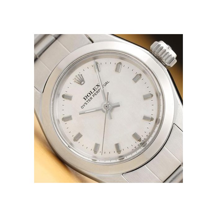 Rolex Oyster PerpetualLadies Oyster Perpetual 6618 Silver Dial 24mm Steel Folded Oyster Watch