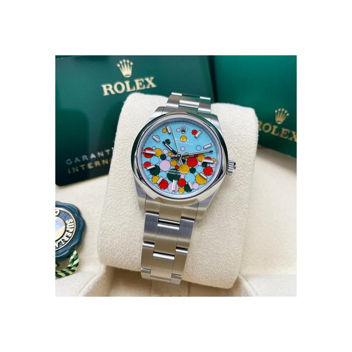 Rolex Oyster PerpetualUNWORN Oyster Perpetual 31mm 277200 Turquoise Celebration Dial Smooth Bezel Oyster Band Full Set Unworn Complete Box & Papers