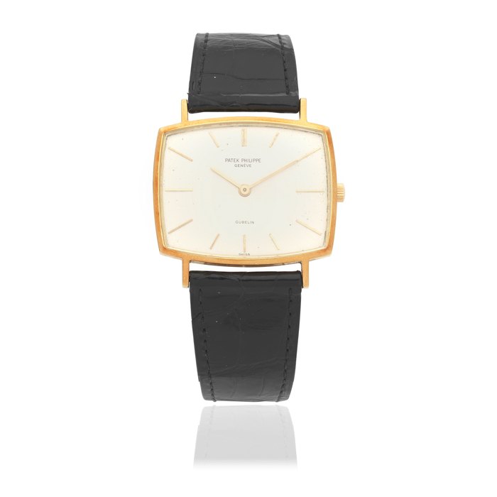 Patek Philippe. An 18K gold manual wind wristwatch Retailed by Gübelin Ref: 3527, Circa 1960