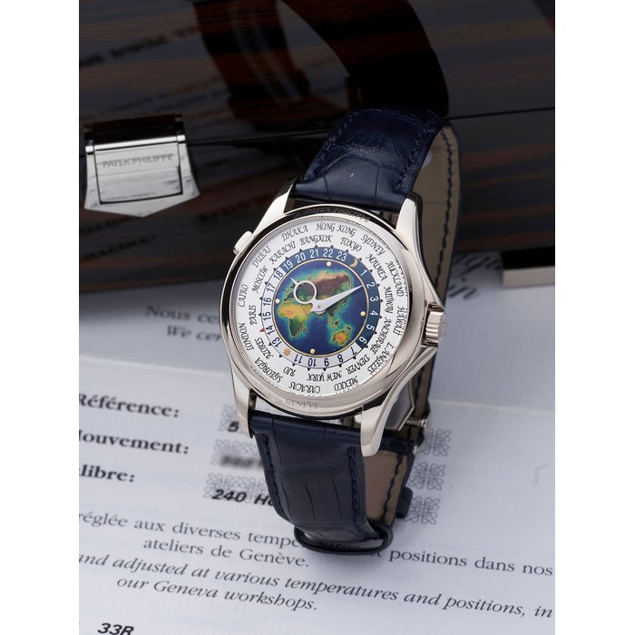 PATEK PHILIPPE | WORLD TIME, REF.5131G-001, A FINE WHITE GOLD WORLD TIME WRISTWATCH WITH CLOISONNÉ ENAMEL DIAL, CIRCA 2013