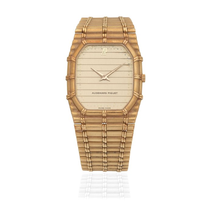 Universal Genève Audemars Piguet. A lady's 18k gold quartz bracelet watch Circa 1980