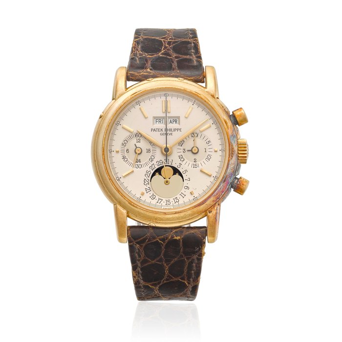 PATEK PHILIPPE. A PHENOMENAL 18K GOLD MANUAL WIND PERPETUAL CALENDAR CHRONOGRAPH WRISTWATCH WITH MOON PHASERef: 3970 E, c.1988