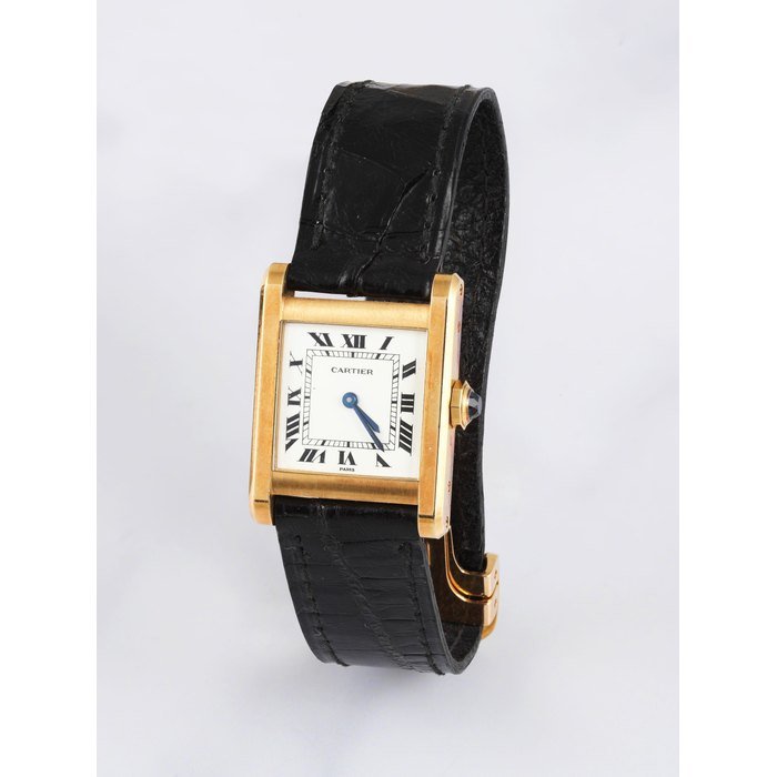 Cartier Cartier. Montre bracelet en or jaune 18K (750) de forme rectangulaire mouvement mécanique Cartier. An 18K gold manual wind rectangular form wristwatch Tank, Circa 1970