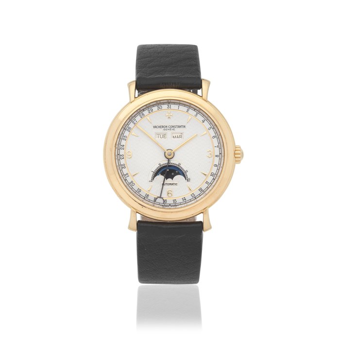 Vacheron Constantin. An 18K gold automatic triple calendar wristwatch with moon phase Ref: 47050, Circa 1995