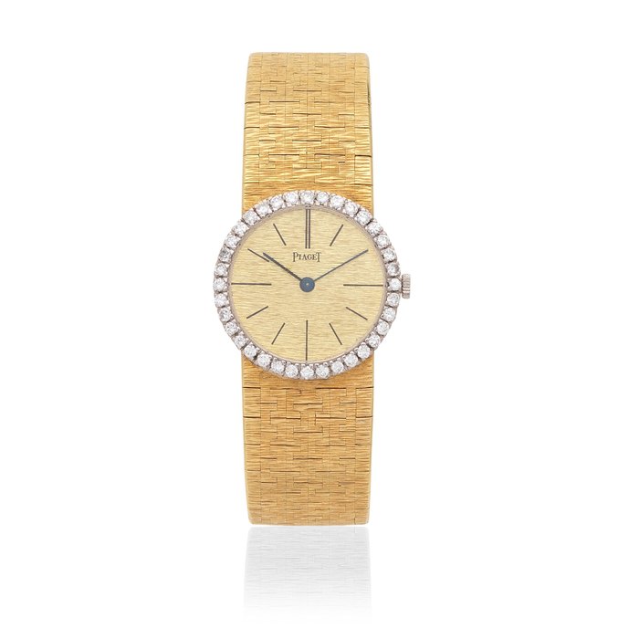Piaget. A lady's 18K gold diamond set manual wind bracelet watch Ref: 926, Circa 1980