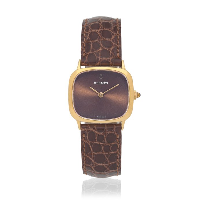 Corum for Hermès. An 18K gold manual wind wristwatch Circa 1980