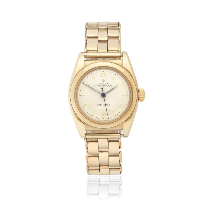 Rolex. A 9K gold automatic bubble back bracelet watch Oyster Perpetual, Ref: 3131, Circa 1947