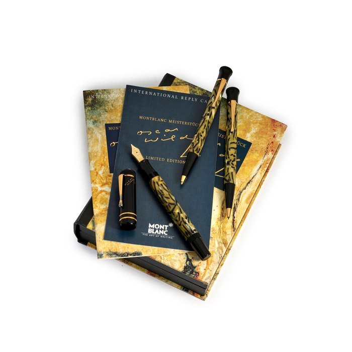 MONTBLANC | WRITERS SERIES - OSCAR WILDE, REF.28702, A LIMITED EDITION SET OF THREE MARBLED PEARL AND VERMEIL WRITING INSTRUMENTS, CONSISTING OF A FOUNTAIN PEN, BALLPOINT PEN AND A MECHANICAL PENCIL, CIRCA 1994
