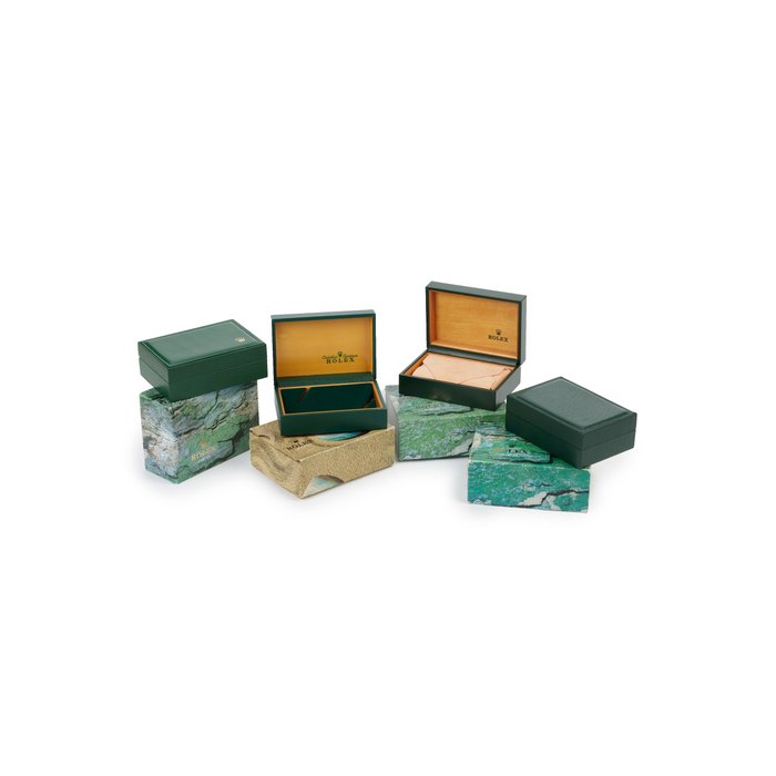 ROLEX | A GROUP OF FOUR PRESENTATION BOXES