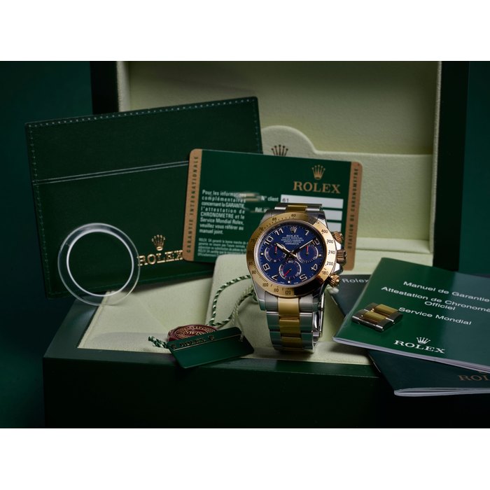 ROLEX | DAYTONA, REF.116523, A RARE YELLOW GOLD AND STAINLESS STEEL CHRONOGRAPH BRACELET WATCH WITH BLUE DIAL, CIRCA 2008
