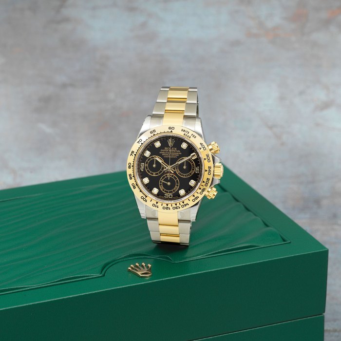 Rolex. A fine 18K gold and stainless steel automatic chronograph bracelet watch with diamond set dial Cosmograph Daytona, Ref: 116503, Recent