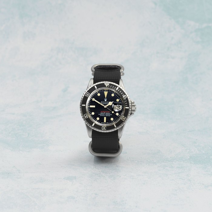 Rolex. A fine stainless steel automatic calendar wristwatch Single Red Submariner, Ref: 1680, Circa 1971