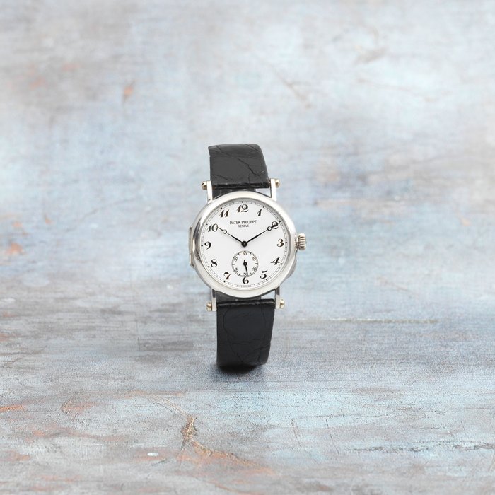 Patek Philippe. A fine 18K white gold manual wind officers Anniversary wristwatch Officier 'Anniversary Edition', Ref: 3960G, Circa 1989