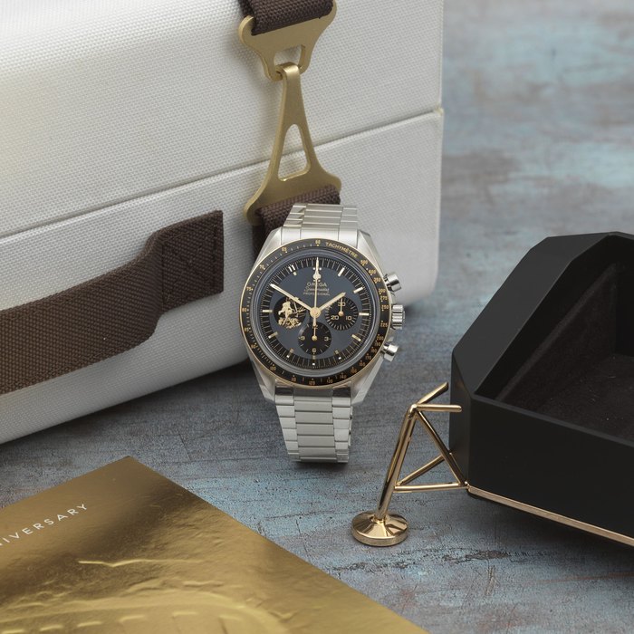 Omega. A Limited Edition stainless steel and 18K gold manual wind chronograph bracelet watch commemorating the 50th Anniversary of the Moon Landing Speedmaster Apollo 11 50th Anniversary, Limited Edition No.2872/6969, Ref: 31020425001001, Purchased 4th February 2021